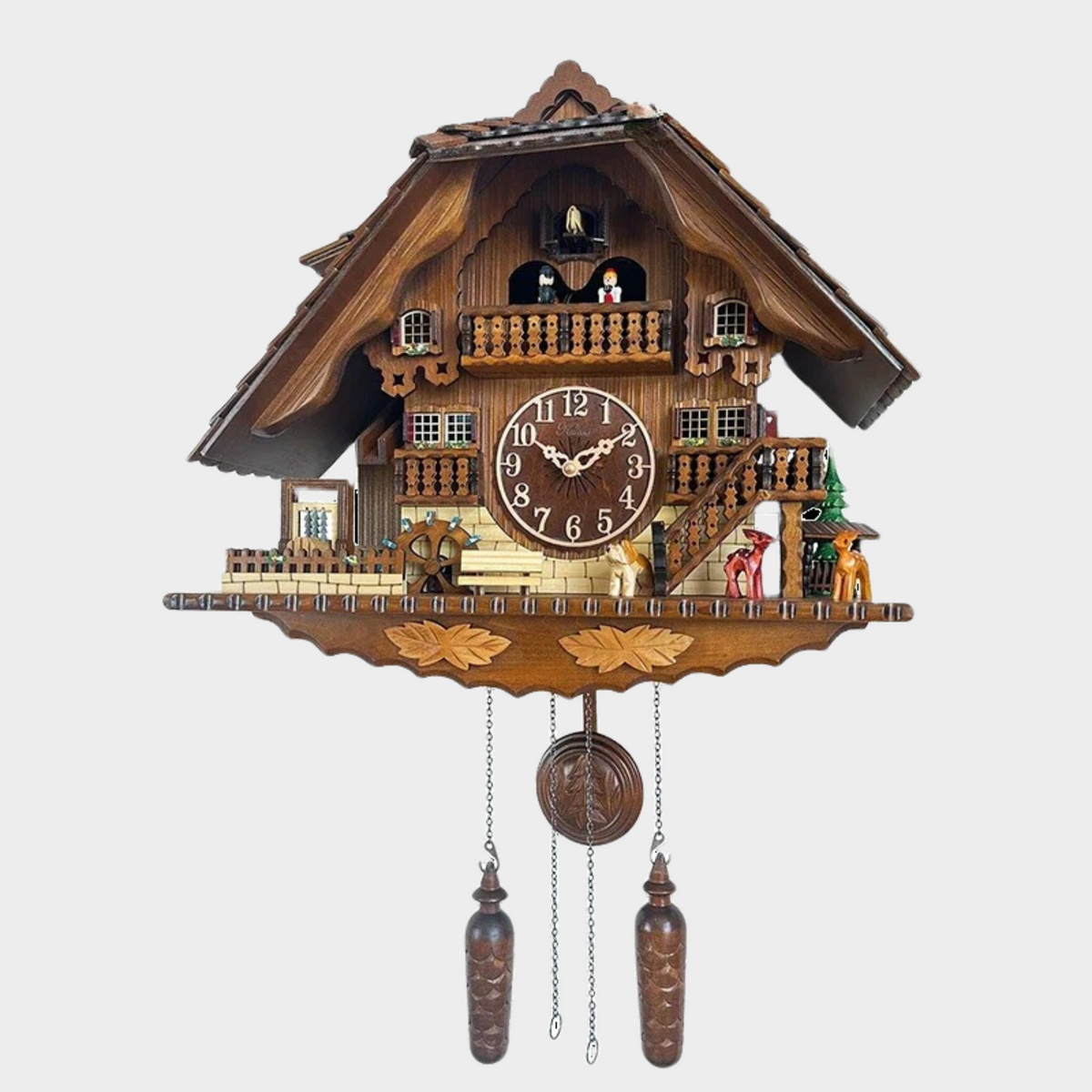 This Swiss Cuckoo Clock brings a polished clock design and decorative character to the wall.