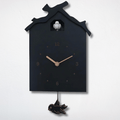 This Cuckoo Modern Clock brings a polished clock design and decorative character to the wall.