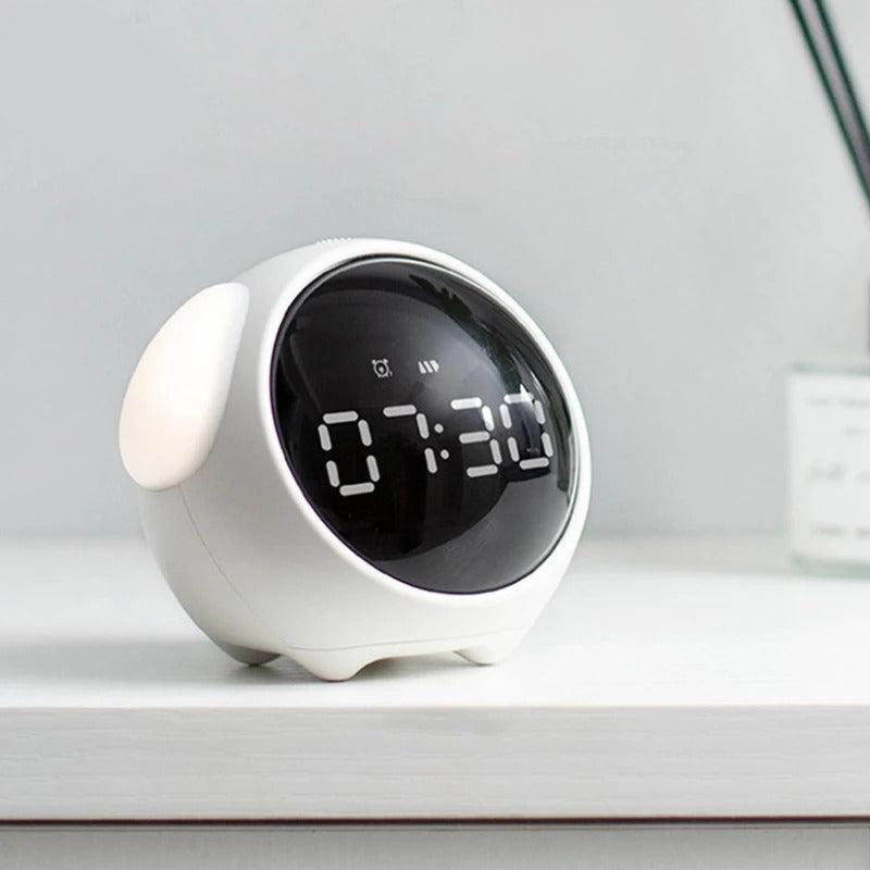 This Emoji Alarm Clock brings a polished clock design and decorative character to the wall.