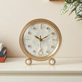 This Tabletop Clock brings a polished clock design and decorative character to the wall.