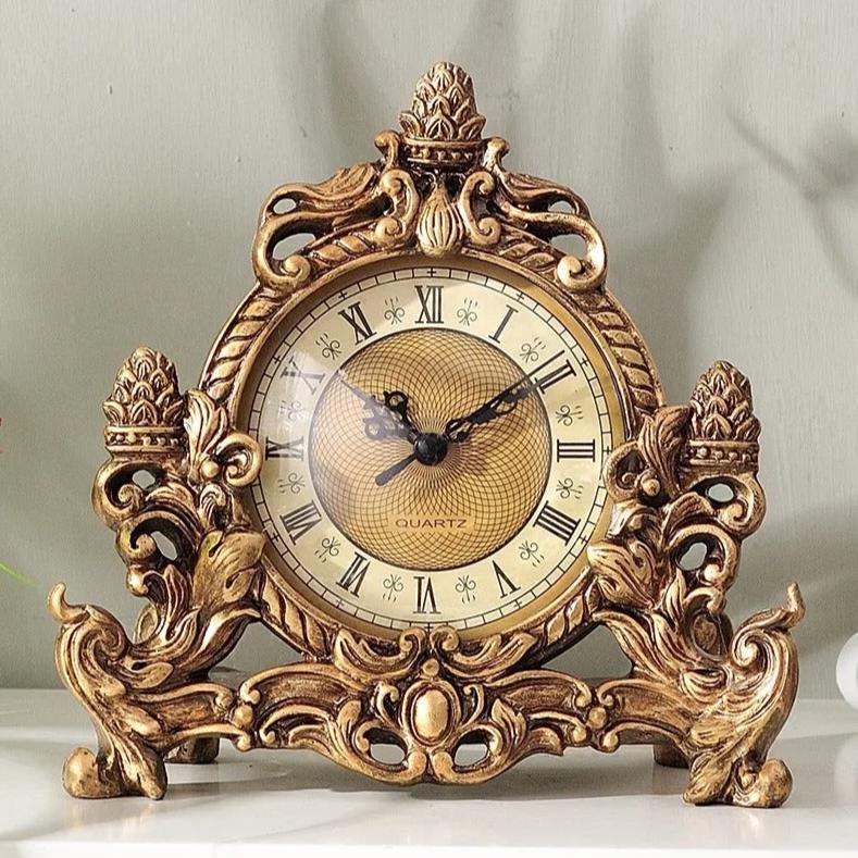 This Antique Tabletop Clock adds a tailored balance of function and visual interest to home decor.