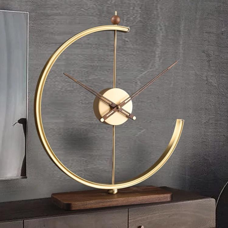 An elegant Designer Tabletop Clock designed to give a room a memorable decorative detail.