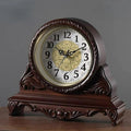 This Antique Tabletop Clock brings a polished clock design and decorative character to the wall.