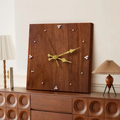 This Wood Squaree Clock combines practical timekeeping with characterful wall decor.
