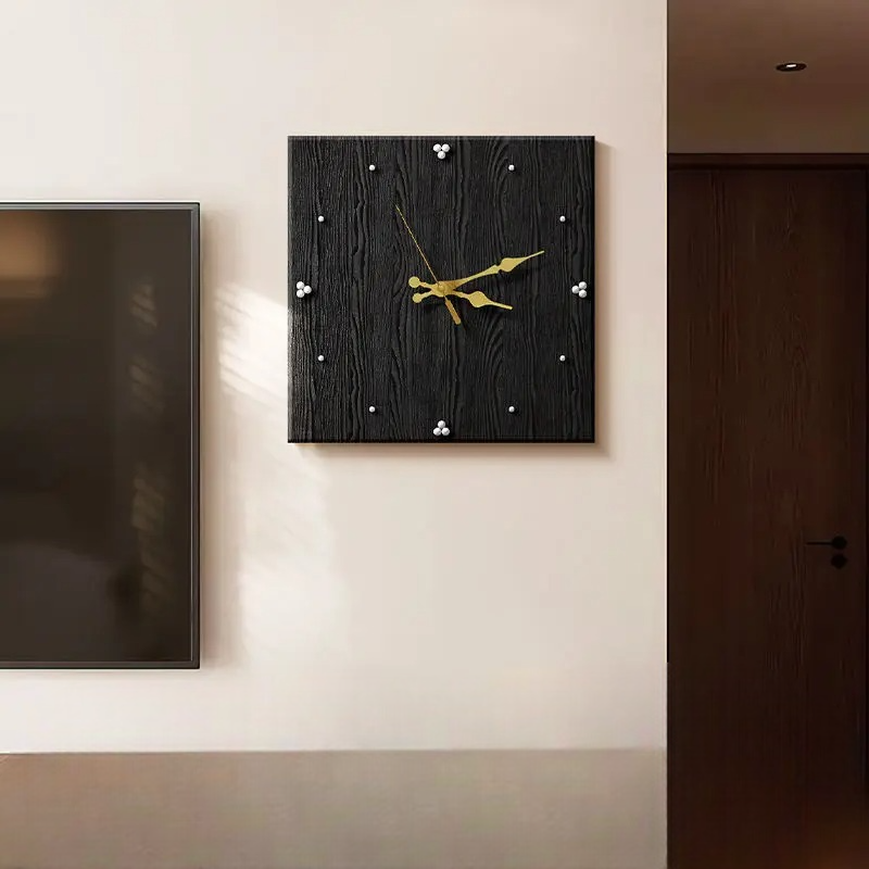 The Wood and Black Clock shown as a refined decorative accent for a modern living space.