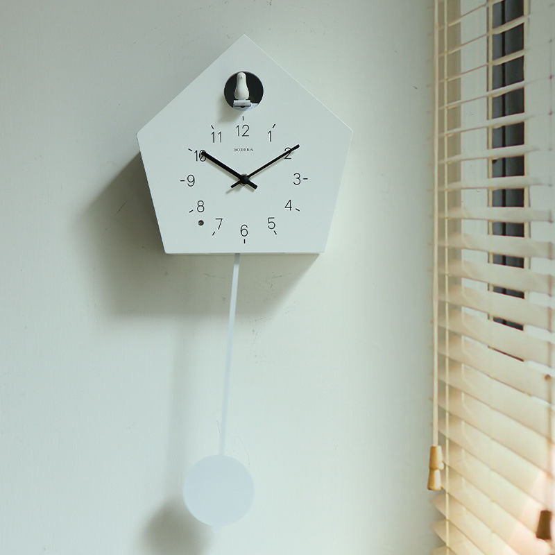 This Designer Cuckoo Clock adds a tailored balance of function and visual interest to home decor.