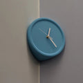 The Corner Clock, presented as a decorative timepiece for a thoughtfully designed home.
