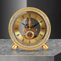 This Designer Table Clock brings a polished clock design and decorative character to the wall.