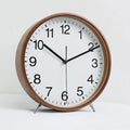 A Wood Table Clock that brings a distinctive finishing touch to a stylish interior.