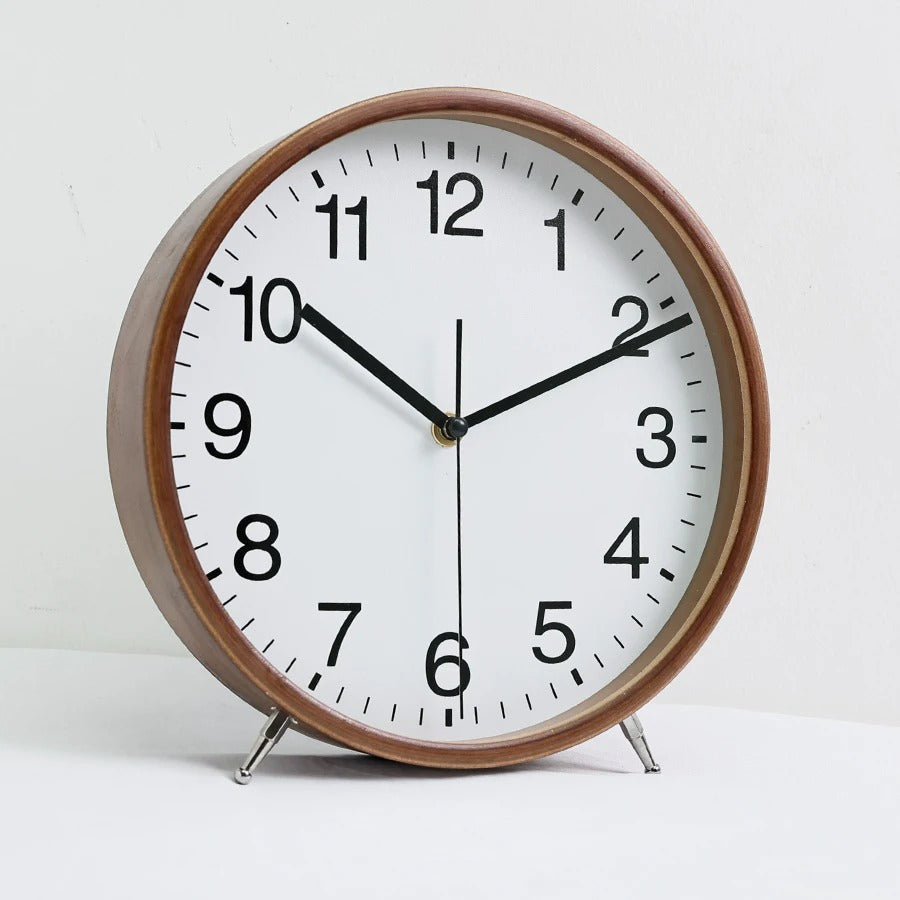 A Wood Table Clock that brings a distinctive finishing touch to a stylish interior.