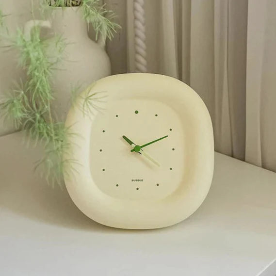This Japanese Table Clock brings a polished clock design and decorative character to the wall.