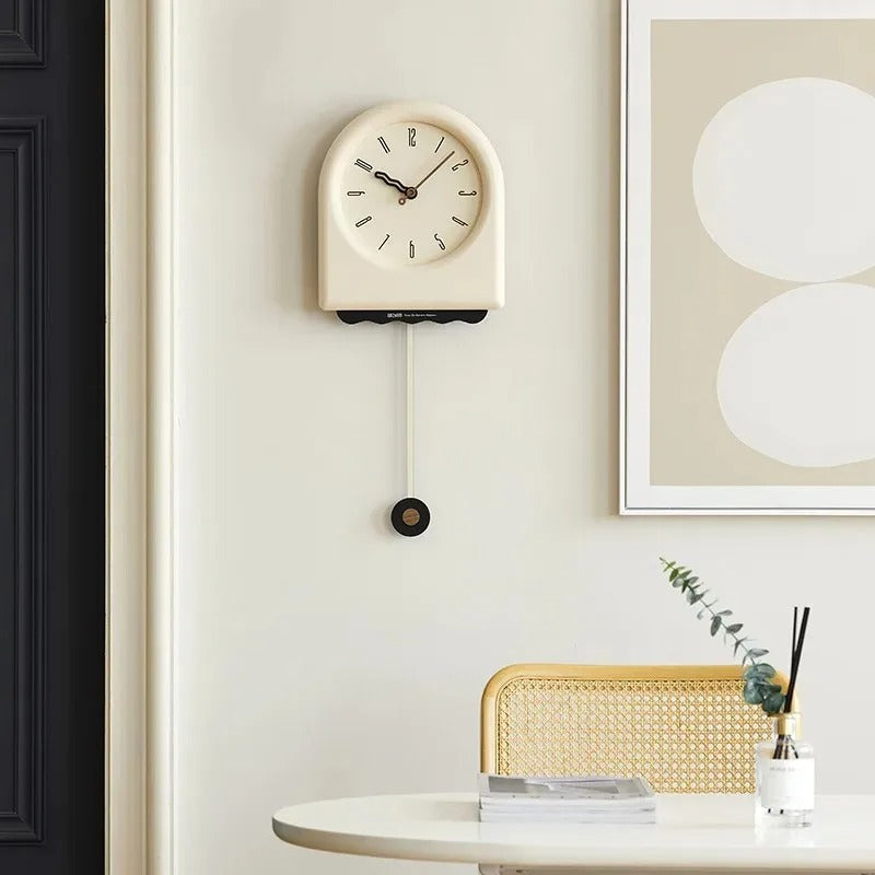 This and Pendulum Clock brings a polished clock design and decorative character to the wall.