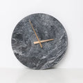 This Marble Clock adds a tailored balance of function and visual interest to home decor.