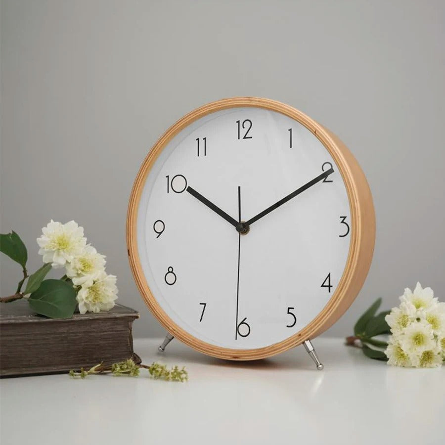 An elegant Modern Tabletop Clock designed to give a room a memorable decorative detail.