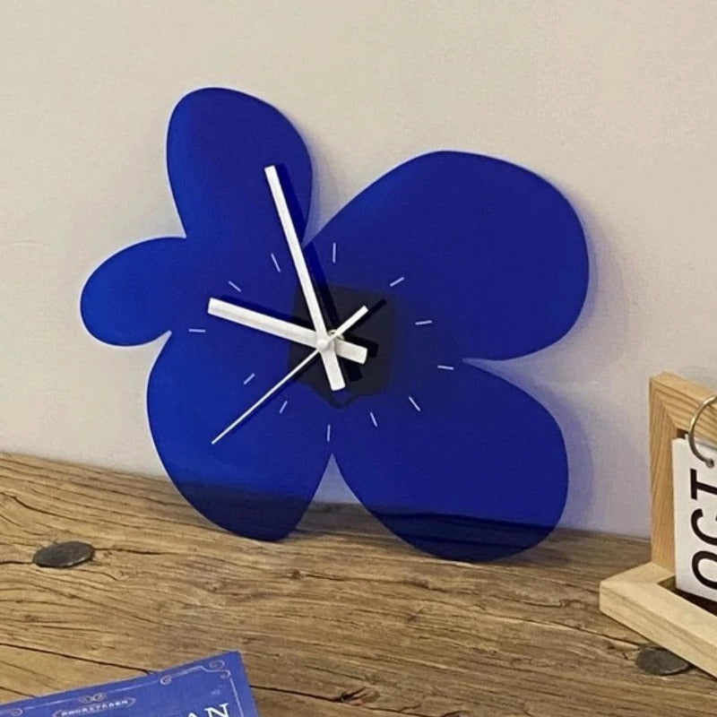 This Blue Wall Clock brings a polished clock design and decorative character to the wall.