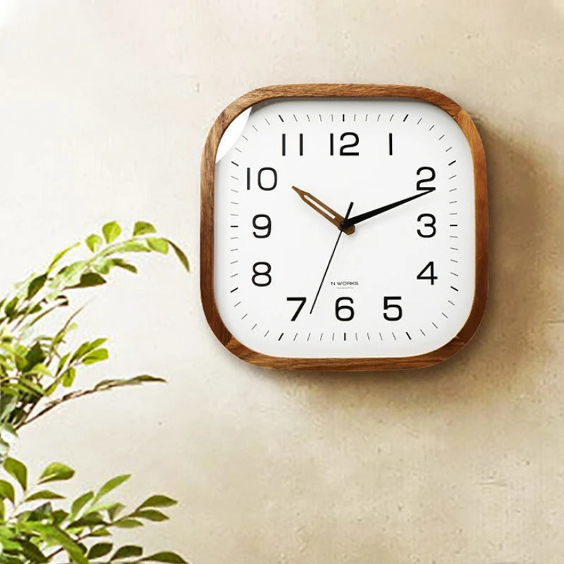 A Wood Squaree Wall Clock with a distinctive presence, made to enhance a curated interior.