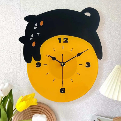 An elegant Cat Black Wall Clock designed to give a room a memorable decorative detail.