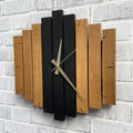 This Wood Modern Wall Clock brings a polished clock design and decorative character to the wall.