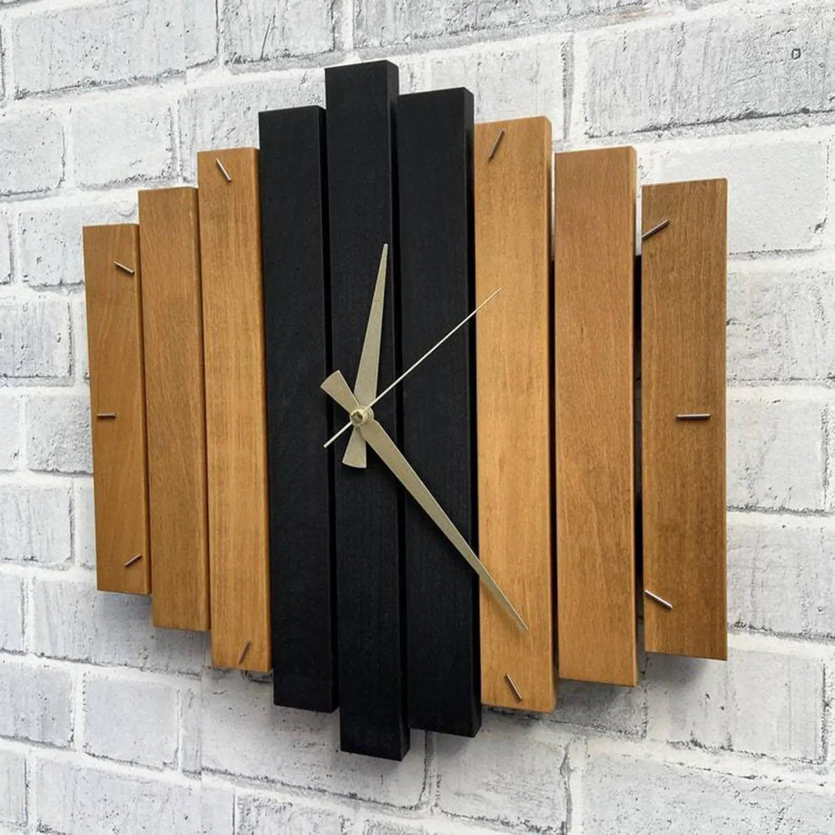This Wood Modern Wall Clock brings a polished clock design and decorative character to the wall.