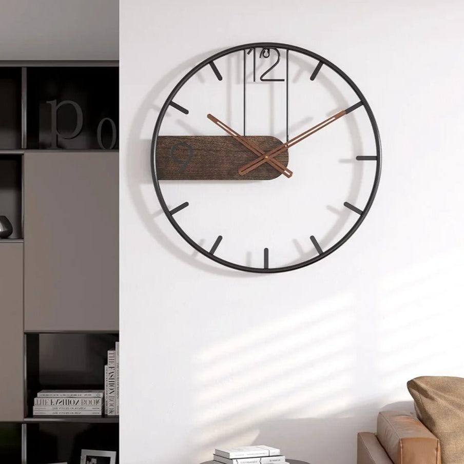 This in Iron Clock brings a polished clock design and decorative character to the wall.