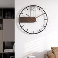 This in Iron Clock brings a polished clock design and decorative character to the wall.