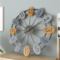 This Metal Wall Clock brings a polished clock design and decorative character to the wall.