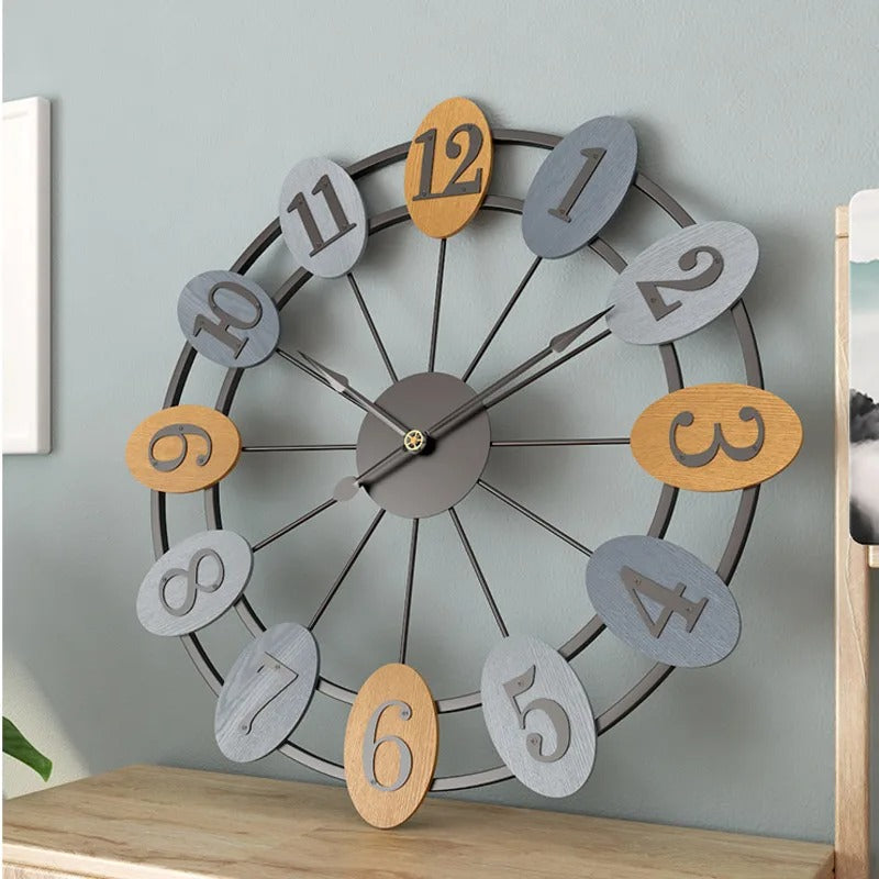 This Metal Wall Clock brings a polished clock design and decorative character to the wall.
