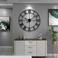 This Black Wall Clock adds a tailored balance of function and visual interest to home decor.