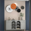 This Nordic Designer Wall Clock adds a tailored balance of function and visual interest to home decor.
