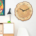 This Unique in Wood Wall Clock adds a tailored balance of function and visual interest to home decor.
