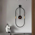 This Black Clock combines practical timekeeping with characterful wall decor.