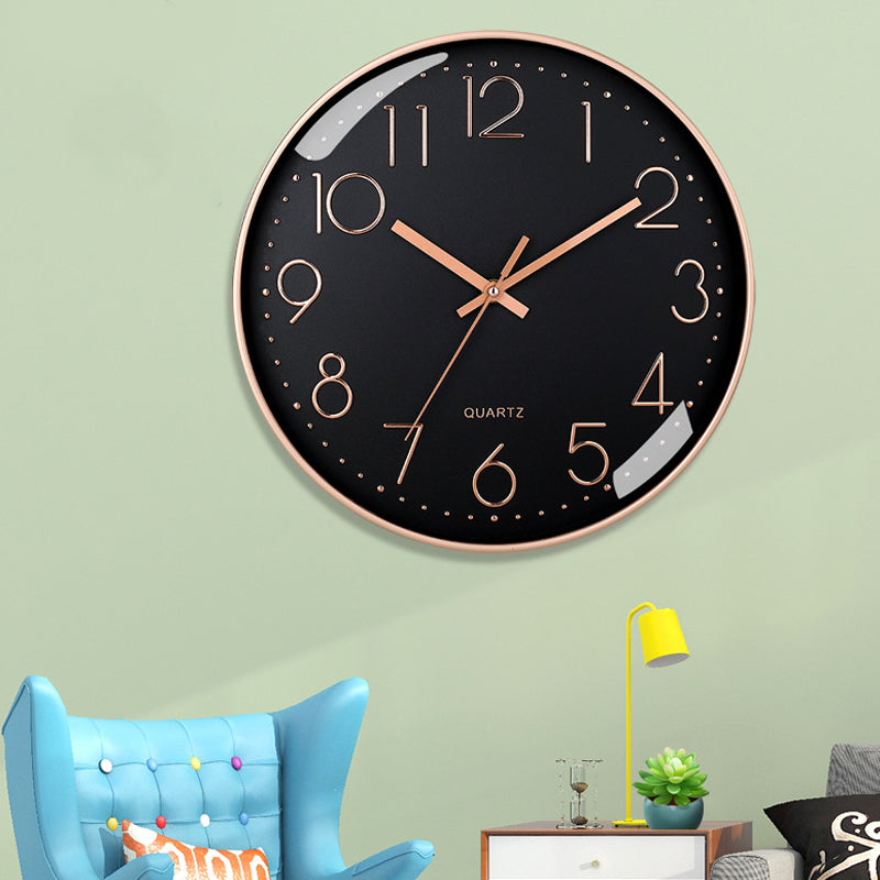 This Black and Or Clock combines practical timekeeping with characterful wall decor.