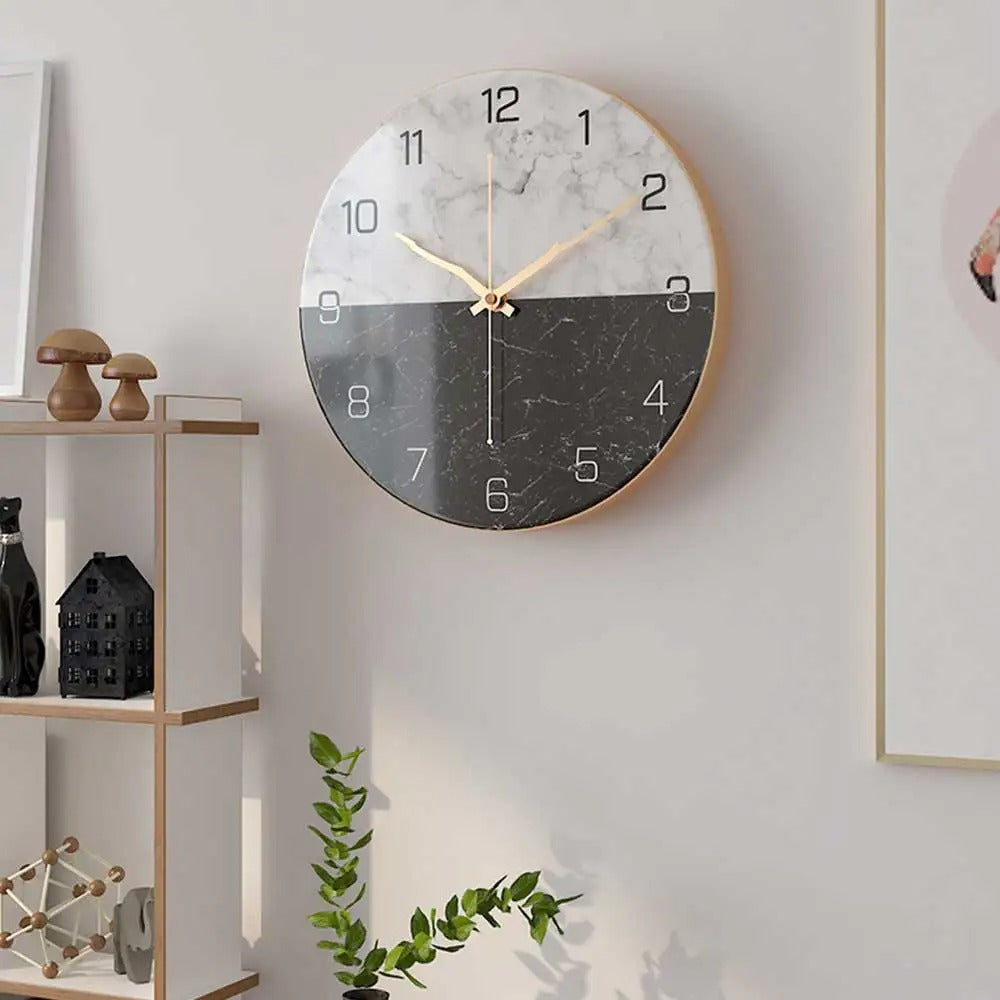 This Silent Marble Clock brings a polished clock design and decorative character to the wall.