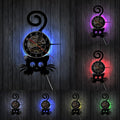 This Cat Black LED Vinyl Record Clock brings a polished clock design and decorative character to the wall.