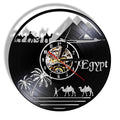 An elegant Egypt Vinyl Record Clock designed to give a room a memorable decorative detail.