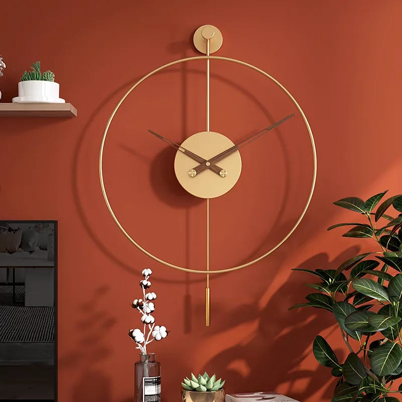 This Gold Designer Wall Clock brings a polished clock design and decorative character to the wall.