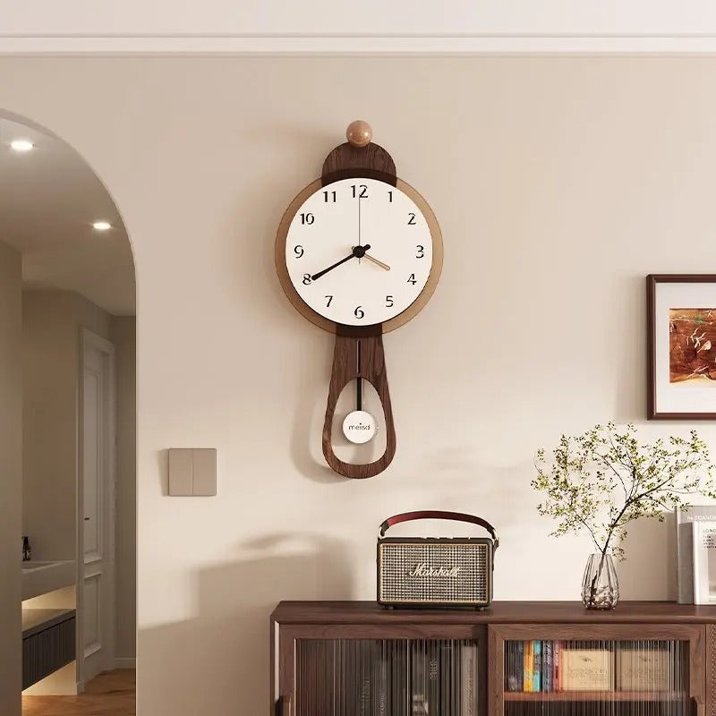 The Wall Pendulum Clocks, presented as a decorative timepiece for a thoughtfully designed home.