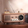 This Vintage Radio Alarm Clock brings a polished clock design and decorative character to the wall.