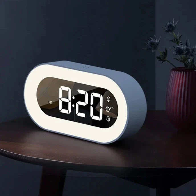 This Nocturne Alarm Clock brings a polished clock design and decorative character to the wall.
